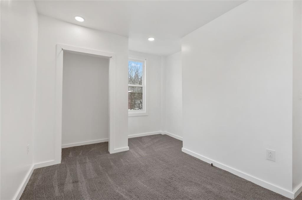 1619 Haug Street Pittsburgh, PA 15212 - Photo 16 of 27 an empty room with windows