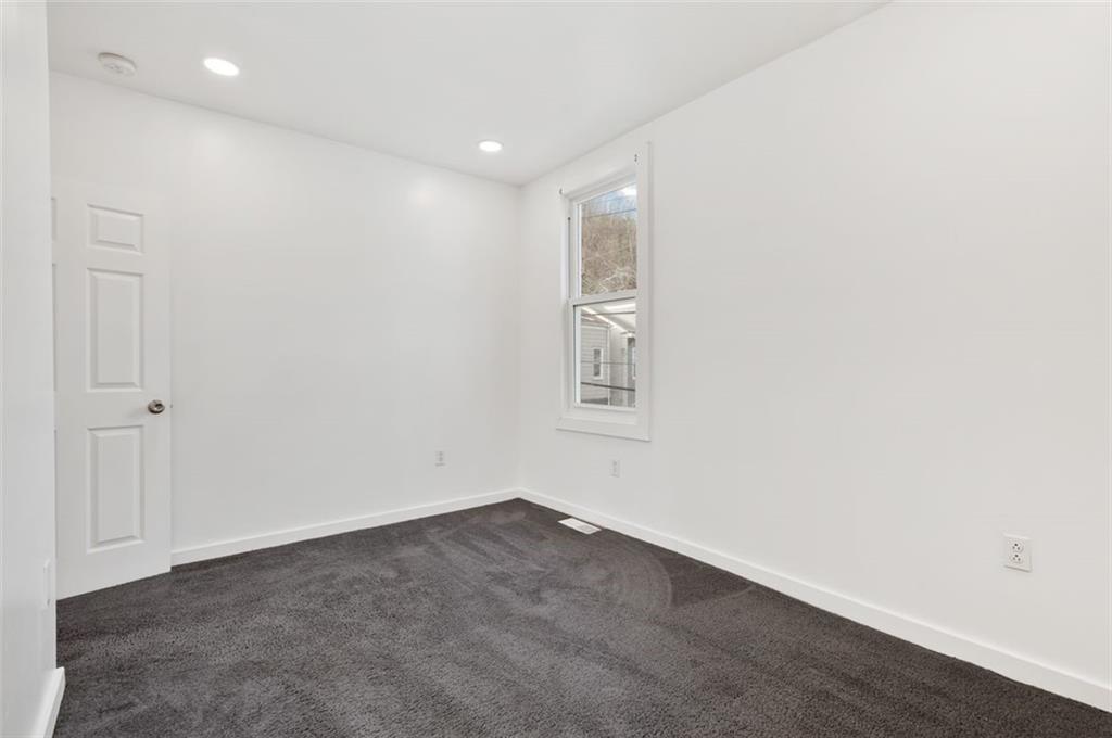 1619 Haug Street Pittsburgh, PA 15212 - Photo 18 of 27 an empty room with windows