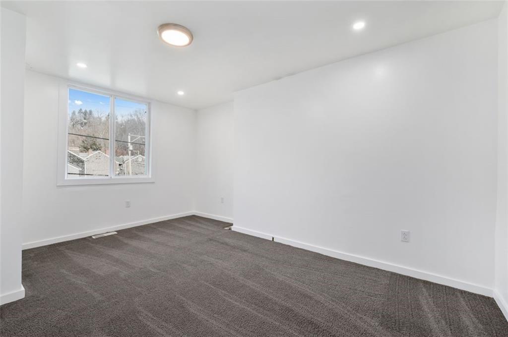 1619 Haug Street Pittsburgh, PA 15212 - Photo 20 of 27 an empty room with windows