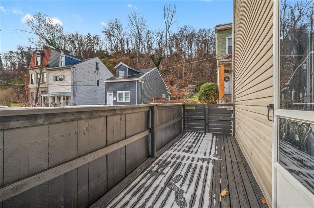 1619 Haug Street Pittsburgh, PA 15212 - Photo 24 of 27 a view of a house with wooden fence