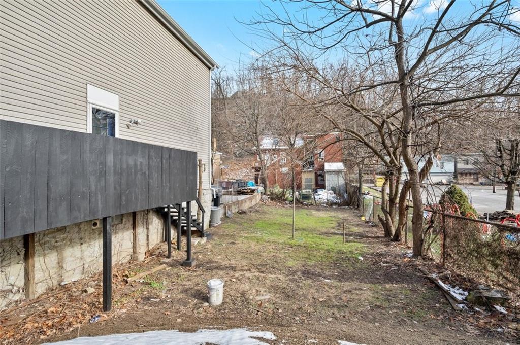 1619 Haug Street Pittsburgh, PA 15212 - Photo 25 of 27 a view of a backyard with a table and chairs