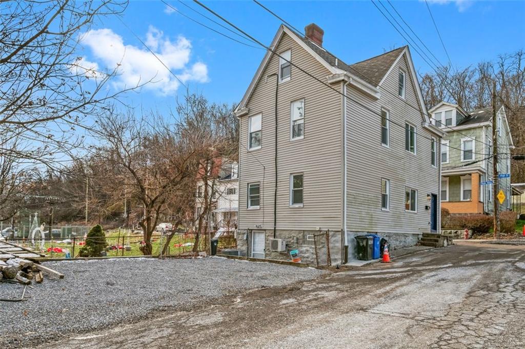 1619 Haug Street Pittsburgh, PA 15212 - Photo 27 of 27 a view of a house with a yard
