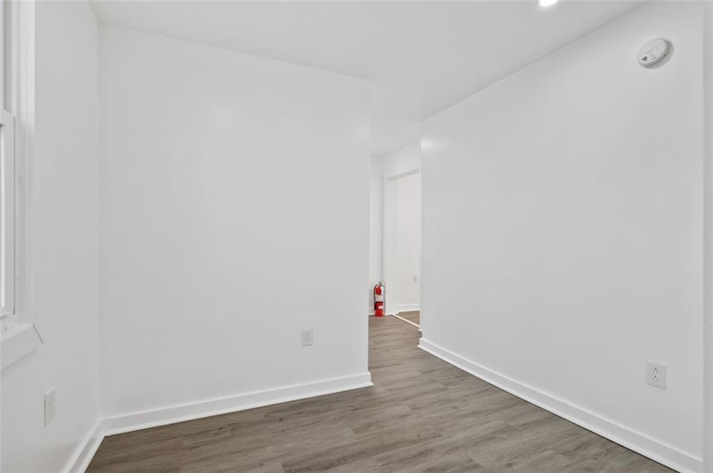 1619 Haug Street Pittsburgh, PA 15212 - Photo 6 of 27 a view of wooden floor and windows in a room