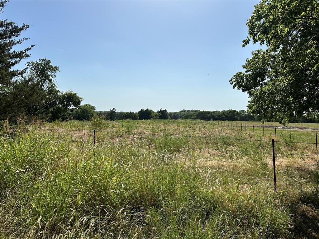 Lot 1 Cedar Road Sherman, TX 75090 - Photo 11 of 20 a view of a lake with houses in the back