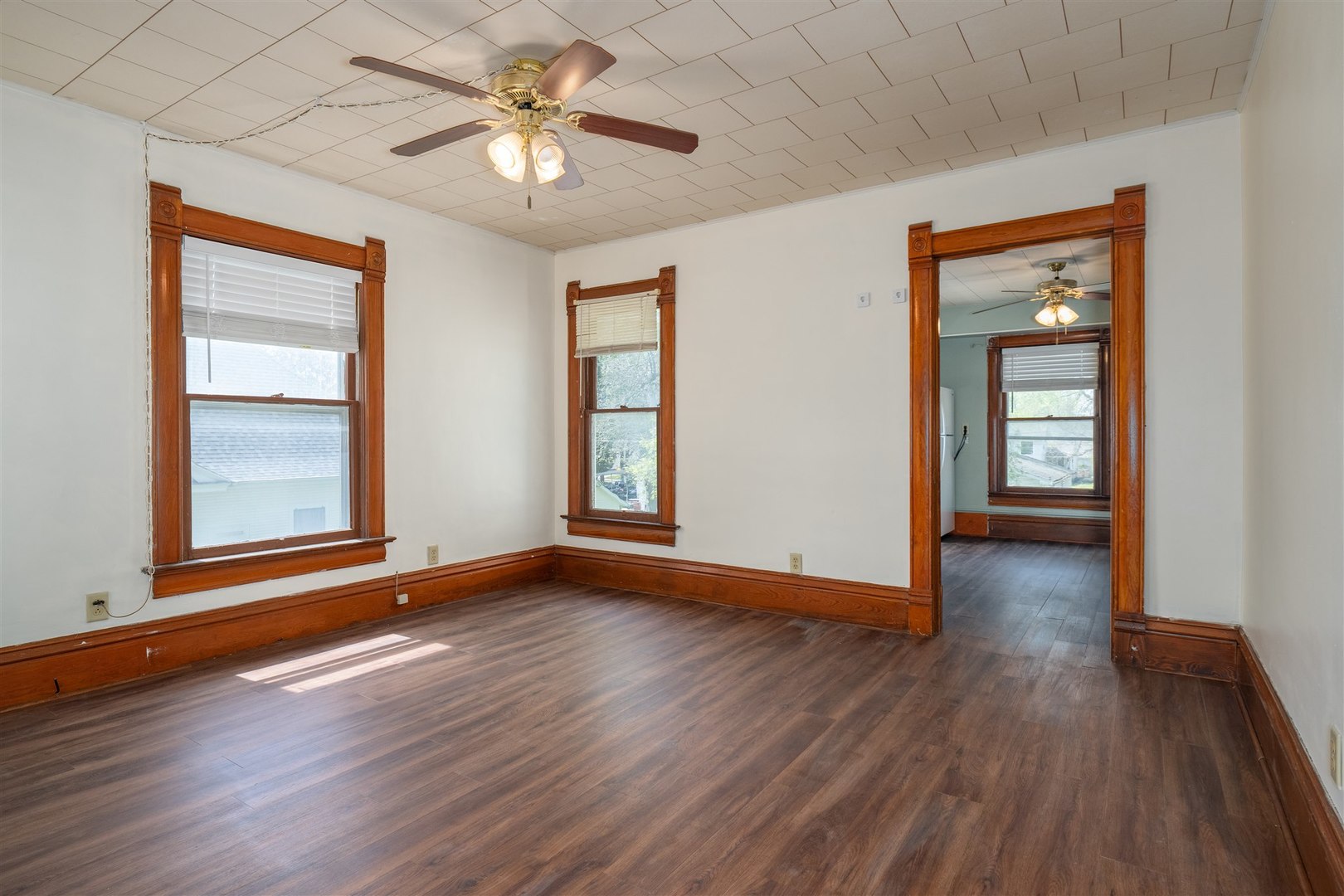 765 North Main Street Pontiac, IL 61764 - Photo 18 of 30 a view of an empty room with window and wooden floor