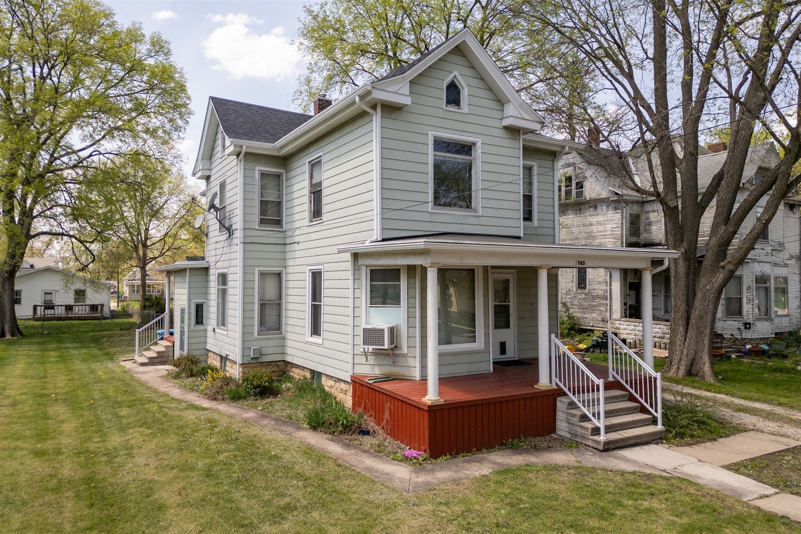 765 North Main Street Pontiac, IL 61764 - Photo 29 of 30 a view of a house with a yard and large tree