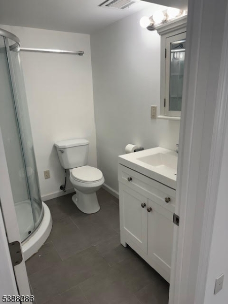 142 Mt Arlington Boulevard Landing, NJ 07850 - Photo 12 of 18 a white toilet sitting next to a bathroom sink