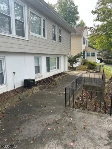 a view of a house with a patio