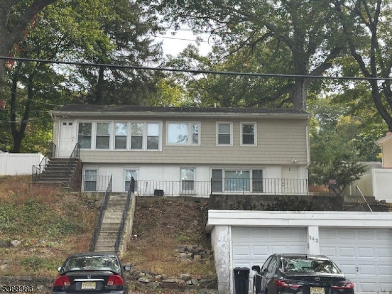 142 Mt Arlington Boulevard Landing, NJ 07850 - Photo 15 of 18 a front view of a house with parking