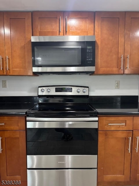 142 Mt Arlington Boulevard Landing, NJ 07850 - Photo 6 of 18 a stove top oven sitting inside of a kitchen