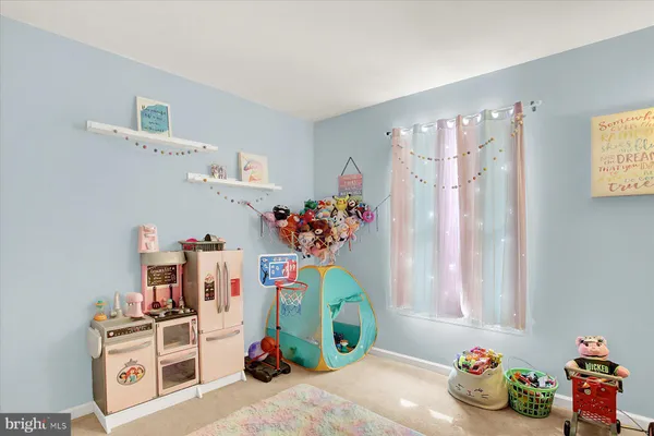 a room with toys and a window
