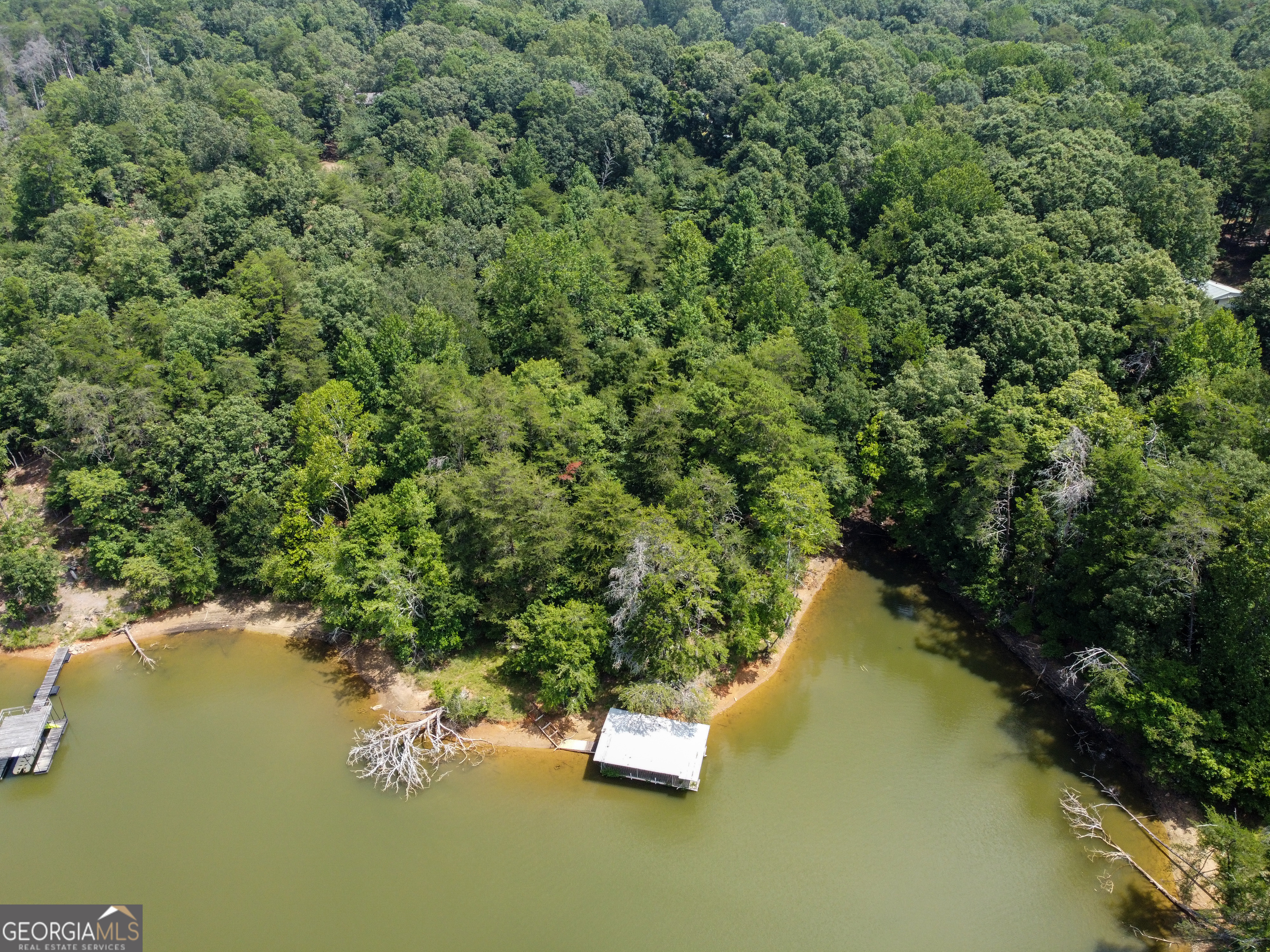 3847 Erwin Drive Gainesville, GA 30506 - Photo 7 of 13 an aerial view of a house with a yard and lake view