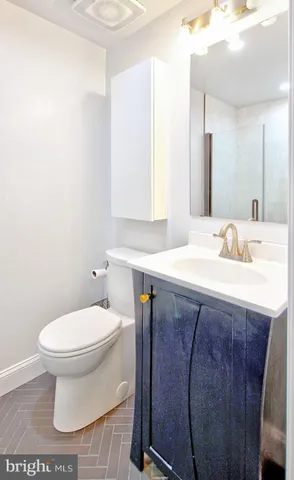 a bathroom with a sink and a toilet