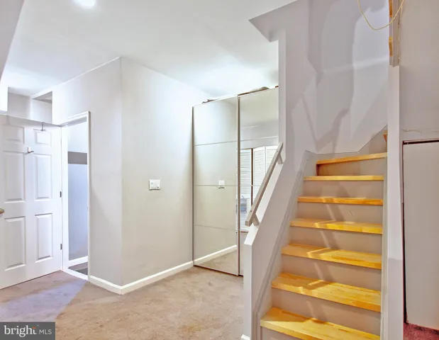 a view of an entryway with staircase