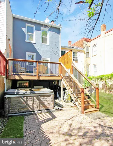 a view of yard with swimming pool and green space