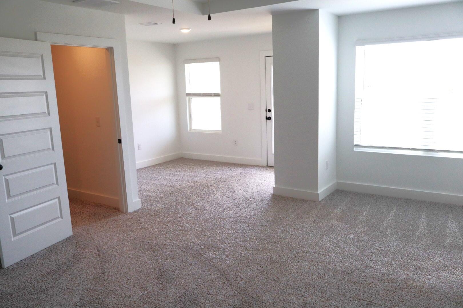 350 Bluebeech Street Freeport, FL 32439 - Photo 36 of 42 an empty room with windows and closet