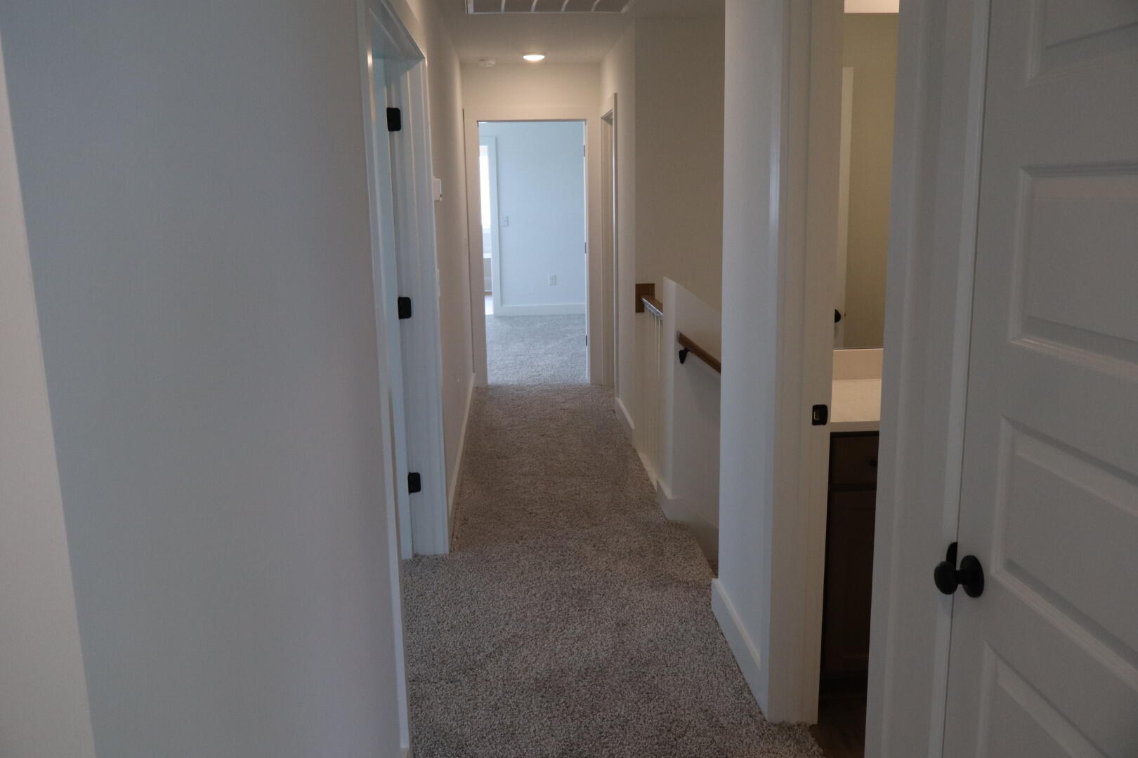 350 Bluebeech Street Freeport, FL 32439 - Photo 38 of 42 a view of a hallway with wooden floor