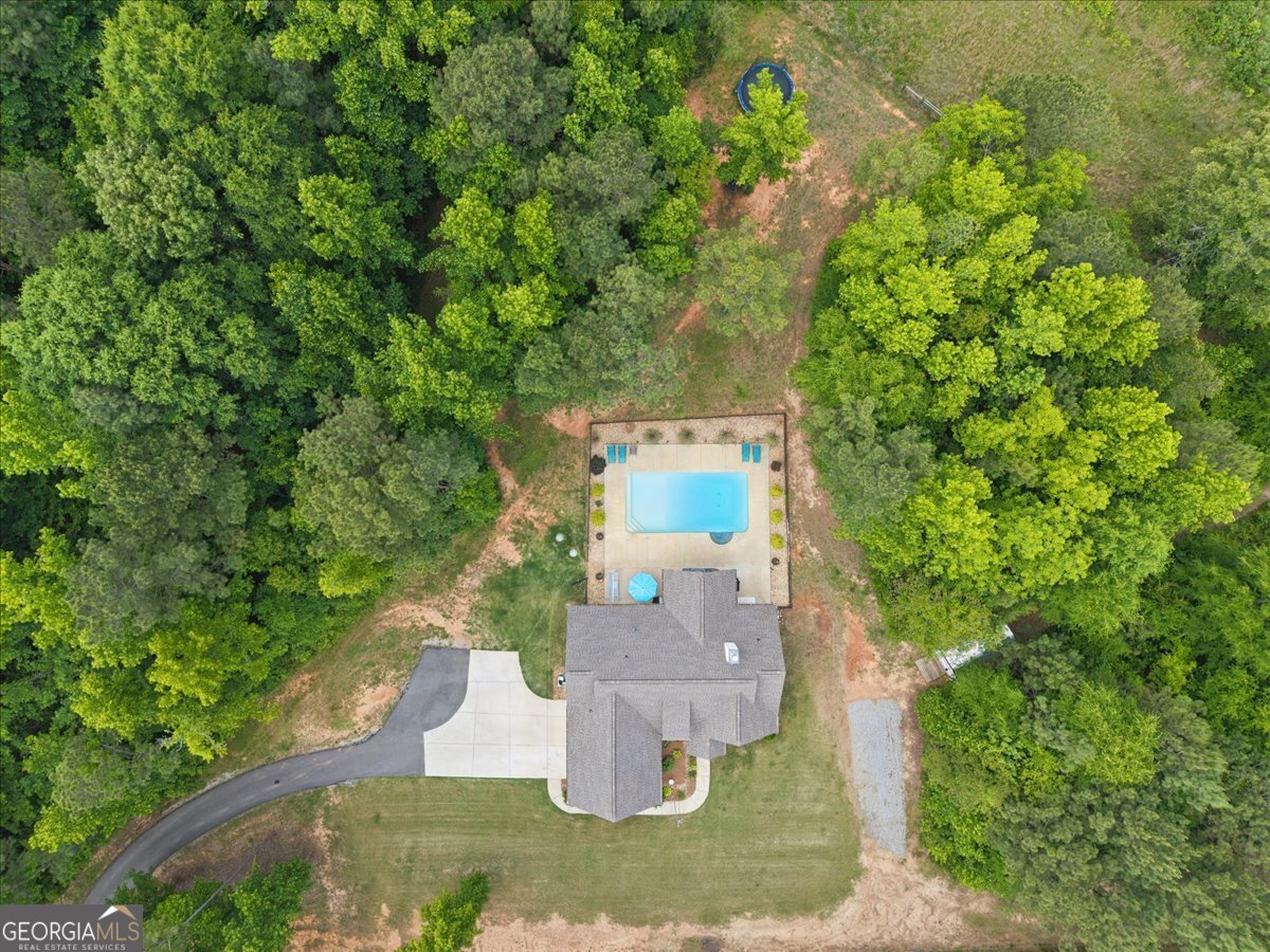 683 Teagle Road Forsyth, GA 31029 - Photo 46 of 50 an aerial view of a house with a yard