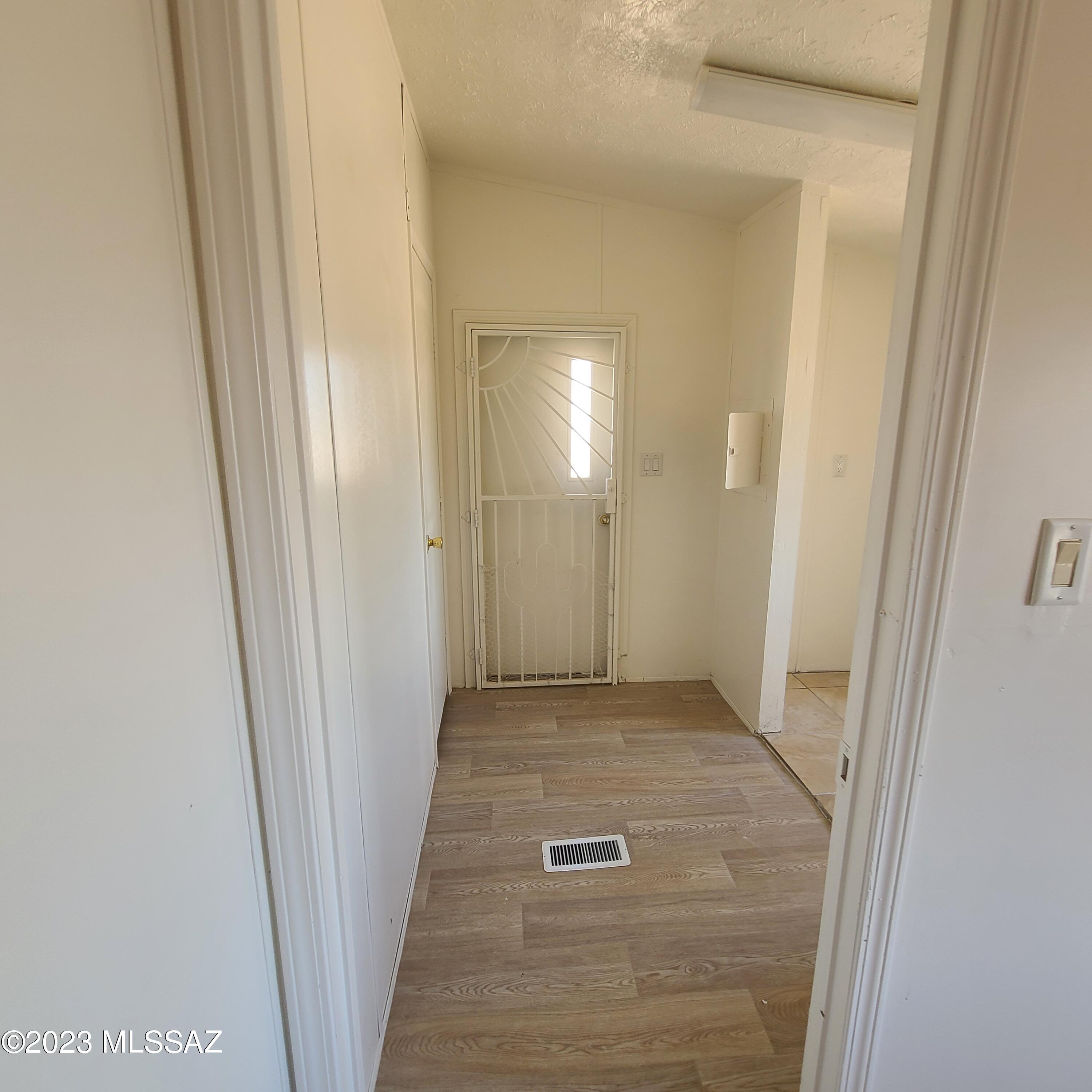 8896 South Marstellar Road Tucson, AZ 85736 - Photo 28 of 39 a view of a hallway