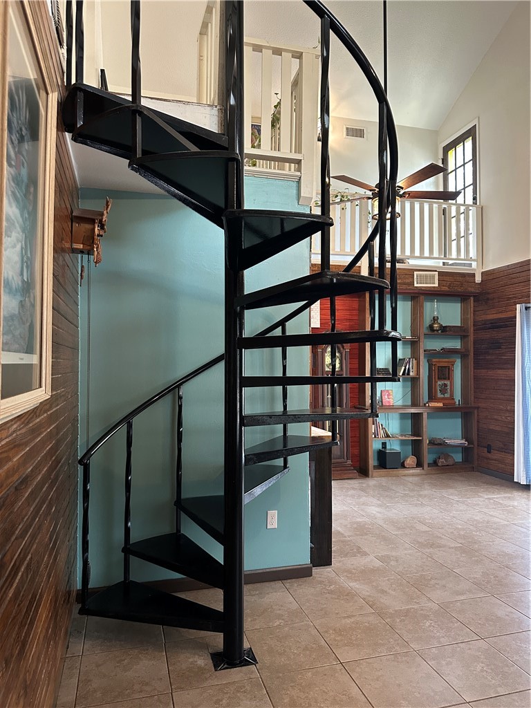 2153 6th Street Ingleside, TX 78362 - Photo 8 of 29 a view of staircase with a book shelf
