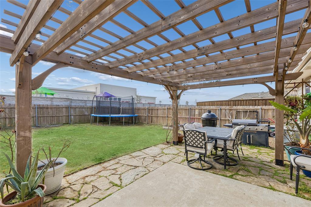 506 Austin Lane Lavon, TX 75166 - Photo 23 of 24 a view of a porch with chairs and backyard