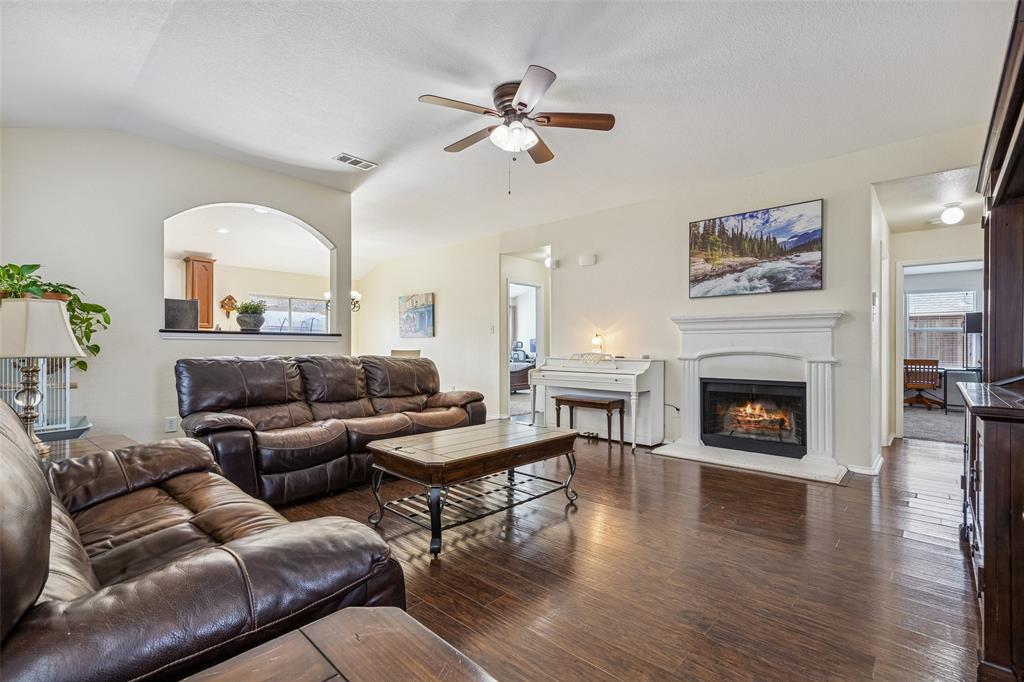 506 Austin Lane Lavon, TX 75166 - Photo 6 of 24 a living room with furniture and a fireplace