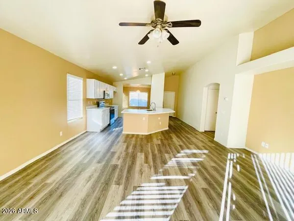 a view of a living room with a flat screen tv