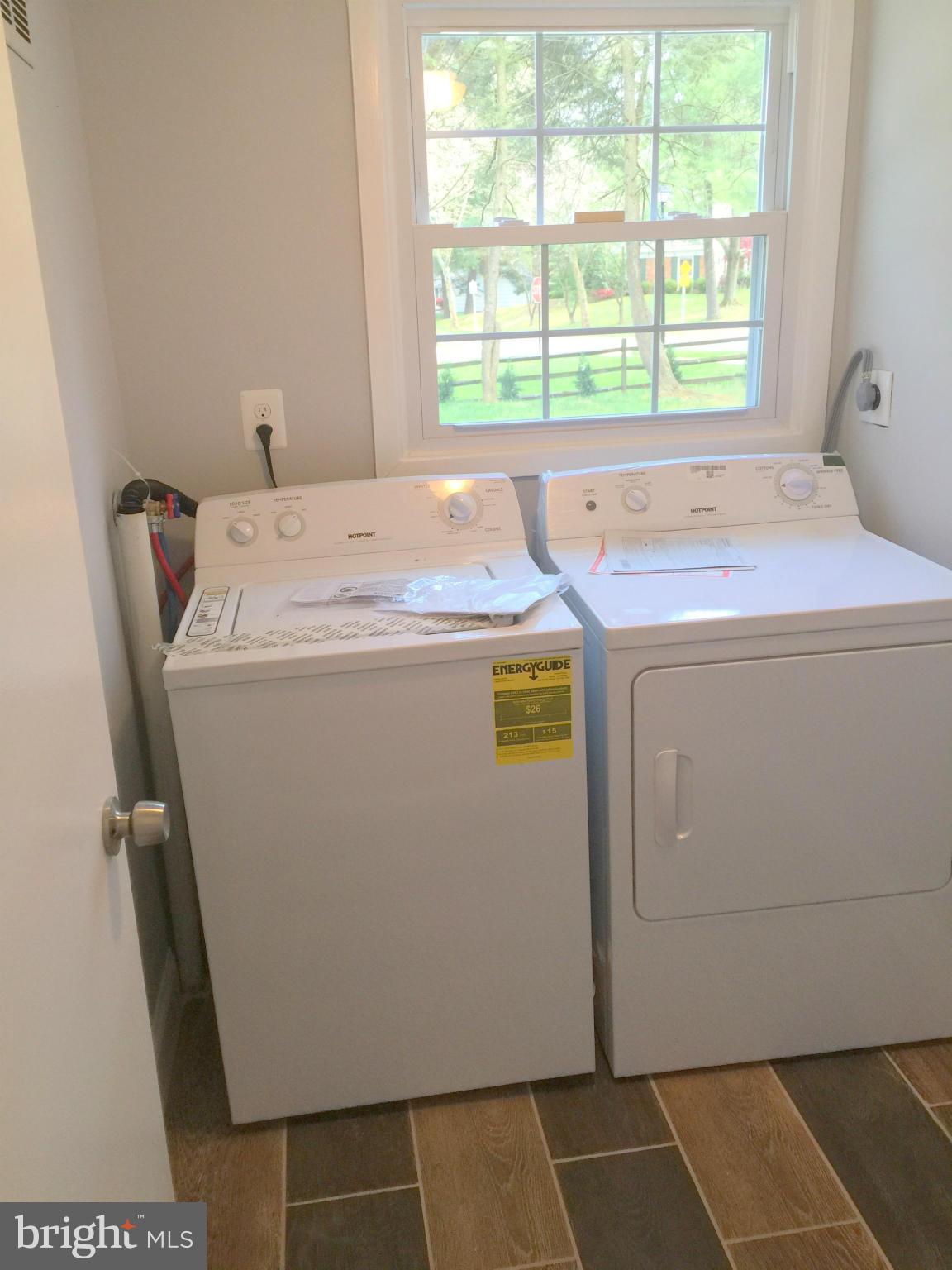 5146 Downwest Ride Columbia, MD 21044 - Photo 19 of 26 a utility room with dryer and washer
