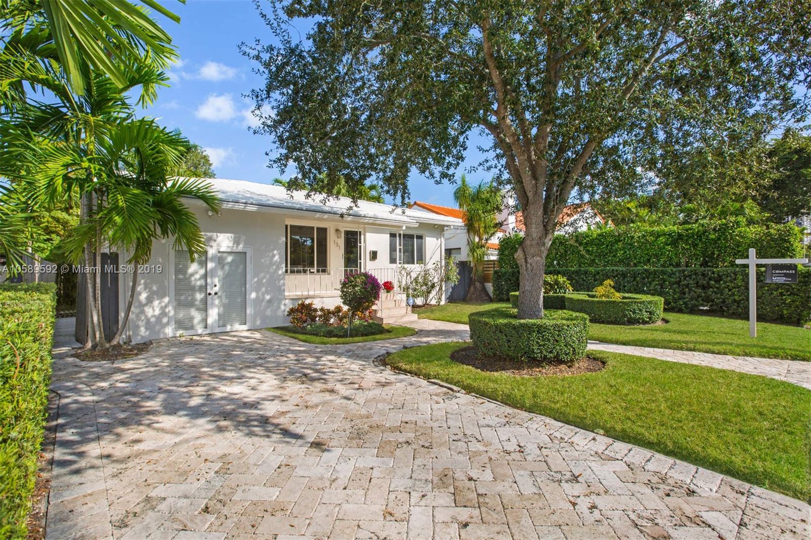 131 Southwest 23rd Road Miami, FL 33129 - Photo 1 of 20 a view of a house with a yard