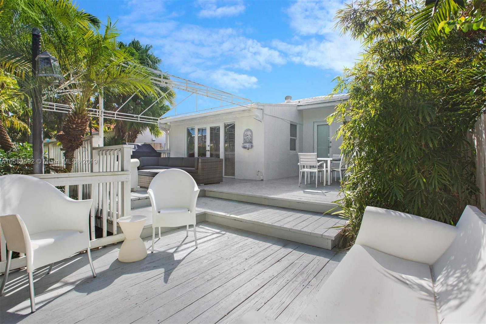 131 Southwest 23rd Road Miami, FL 33129 - Photo 17 of 20 a view of a patio in the backyard