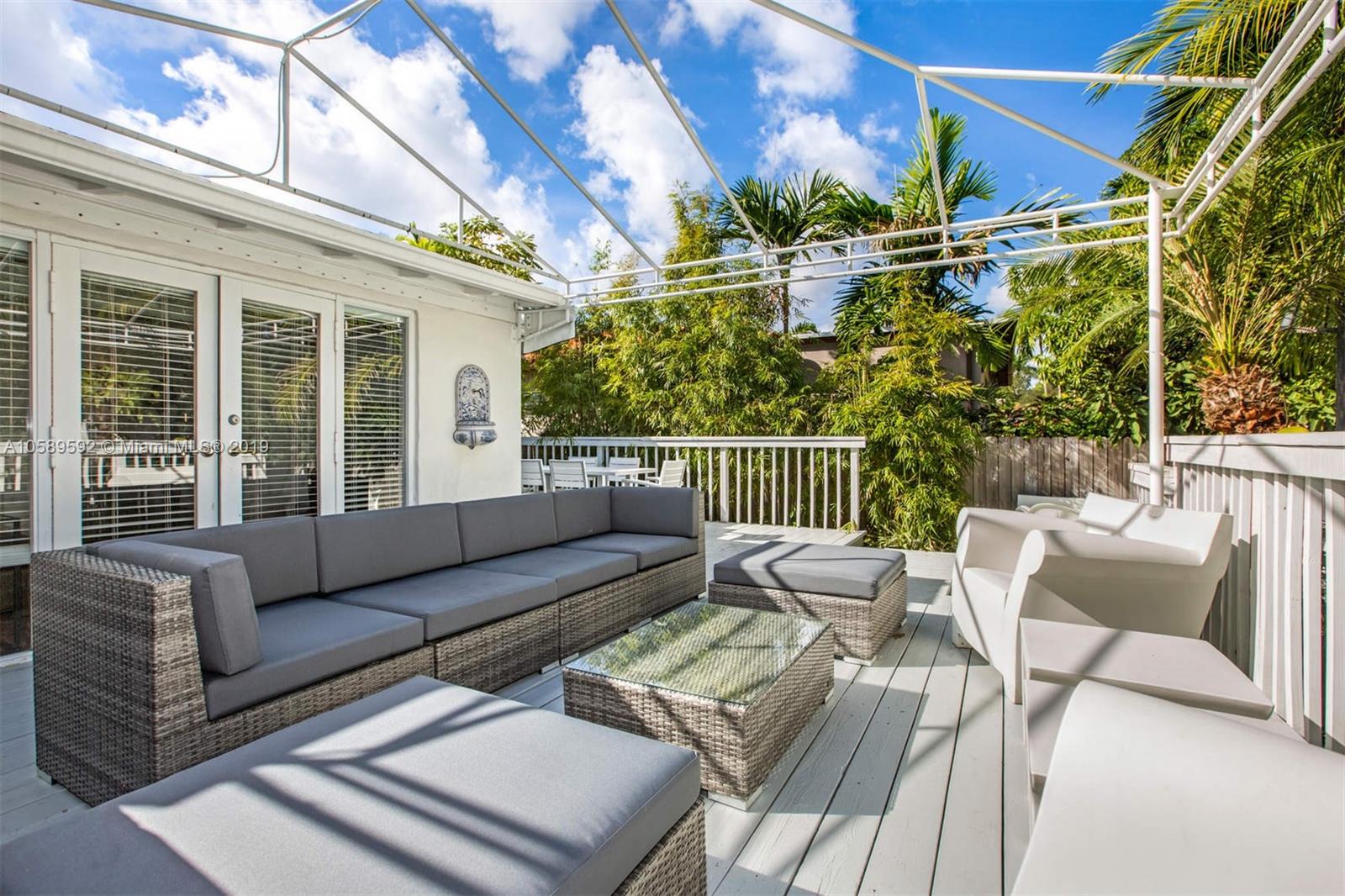 131 Southwest 23rd Road Miami, FL 33129 - Photo 18 of 20 a view of a patio on the deck