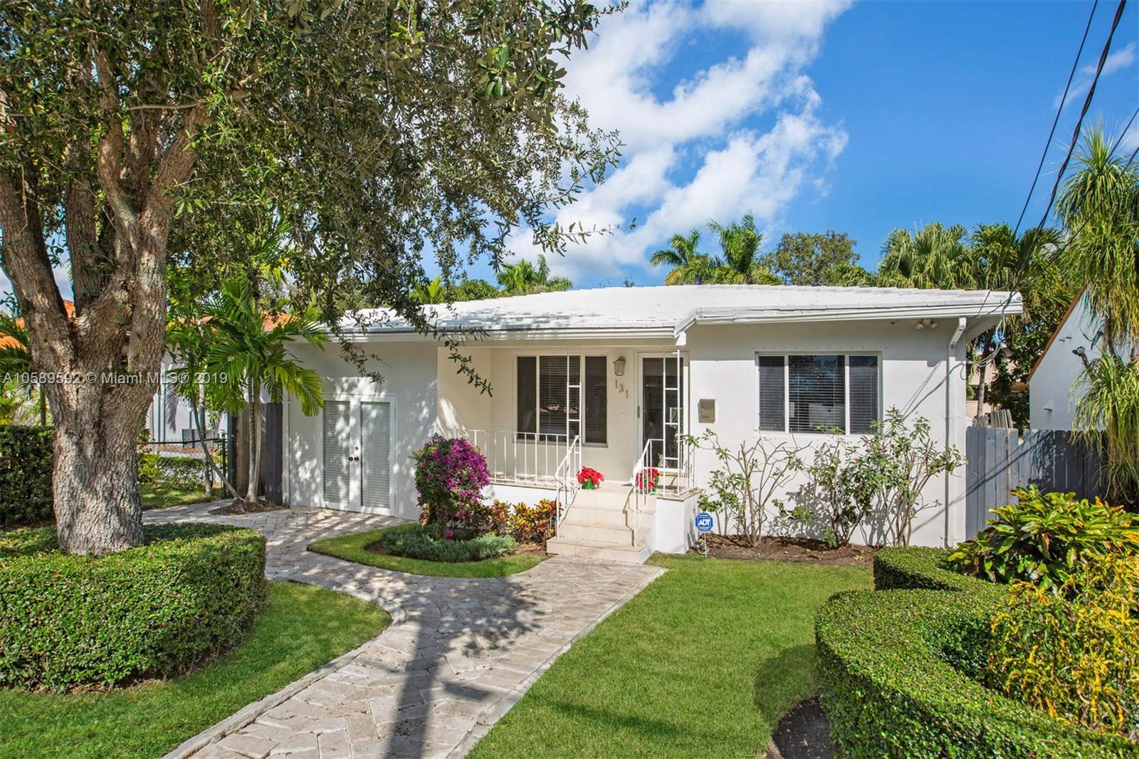 131 Southwest 23rd Road Miami, FL 33129 - Photo 20 of 20 a front view of a house with garden