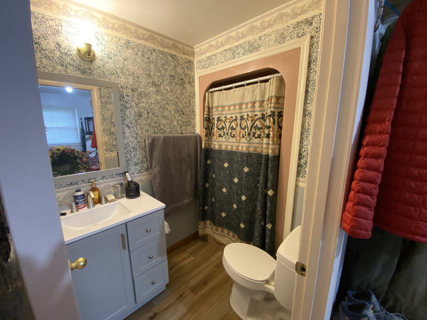 1230 East Calumet Street Centralia, IL 62801 - Photo 9 of 23 a bathroom with a toilet sink vanity granite and shower