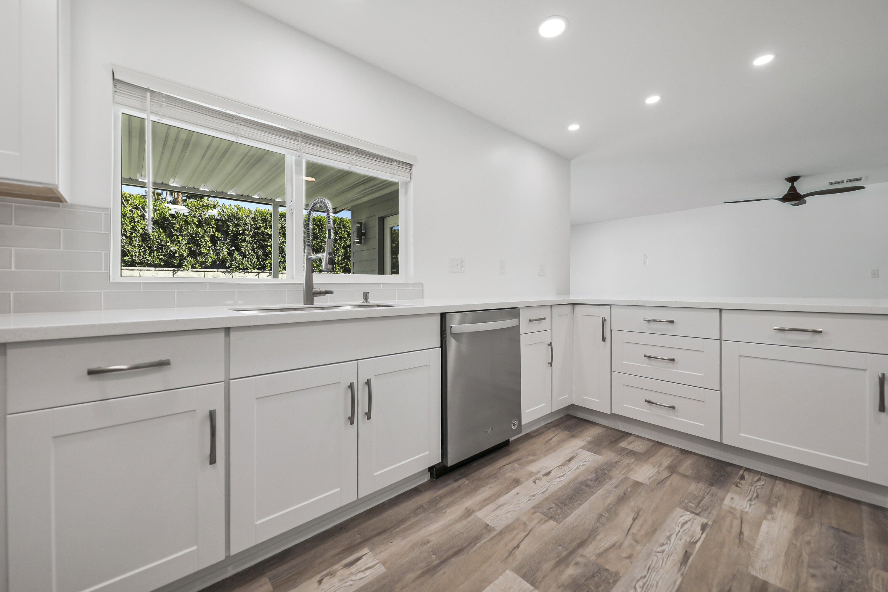 126 Monte Carlo Street Rancho Mirage, CA 92270 - Photo 14 of 33 a view of a sink and dishwasher with window