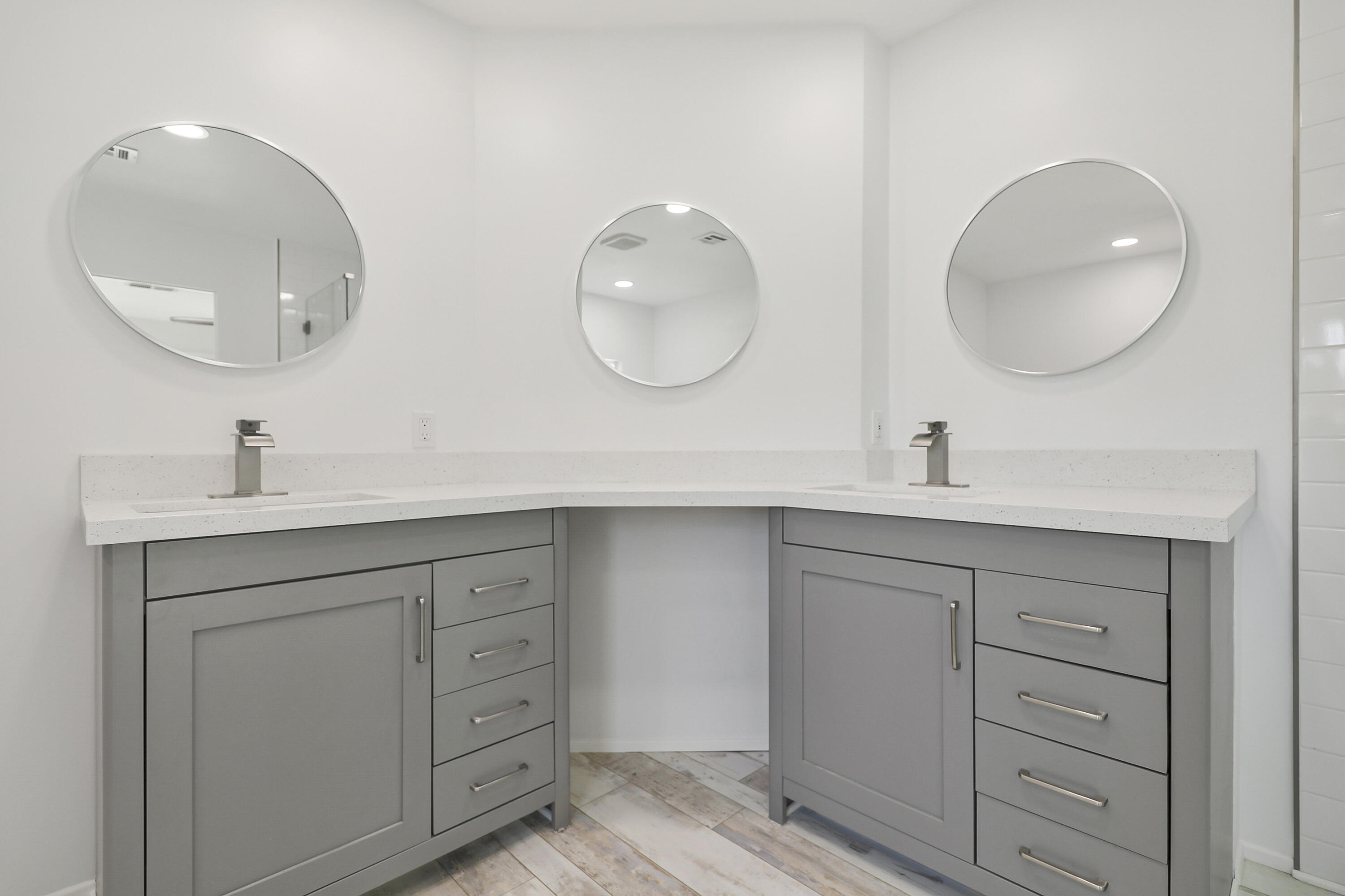 126 Monte Carlo Street Rancho Mirage, CA 92270 - Photo 20 of 33 a bathroom with a double vanity sink and a mirror