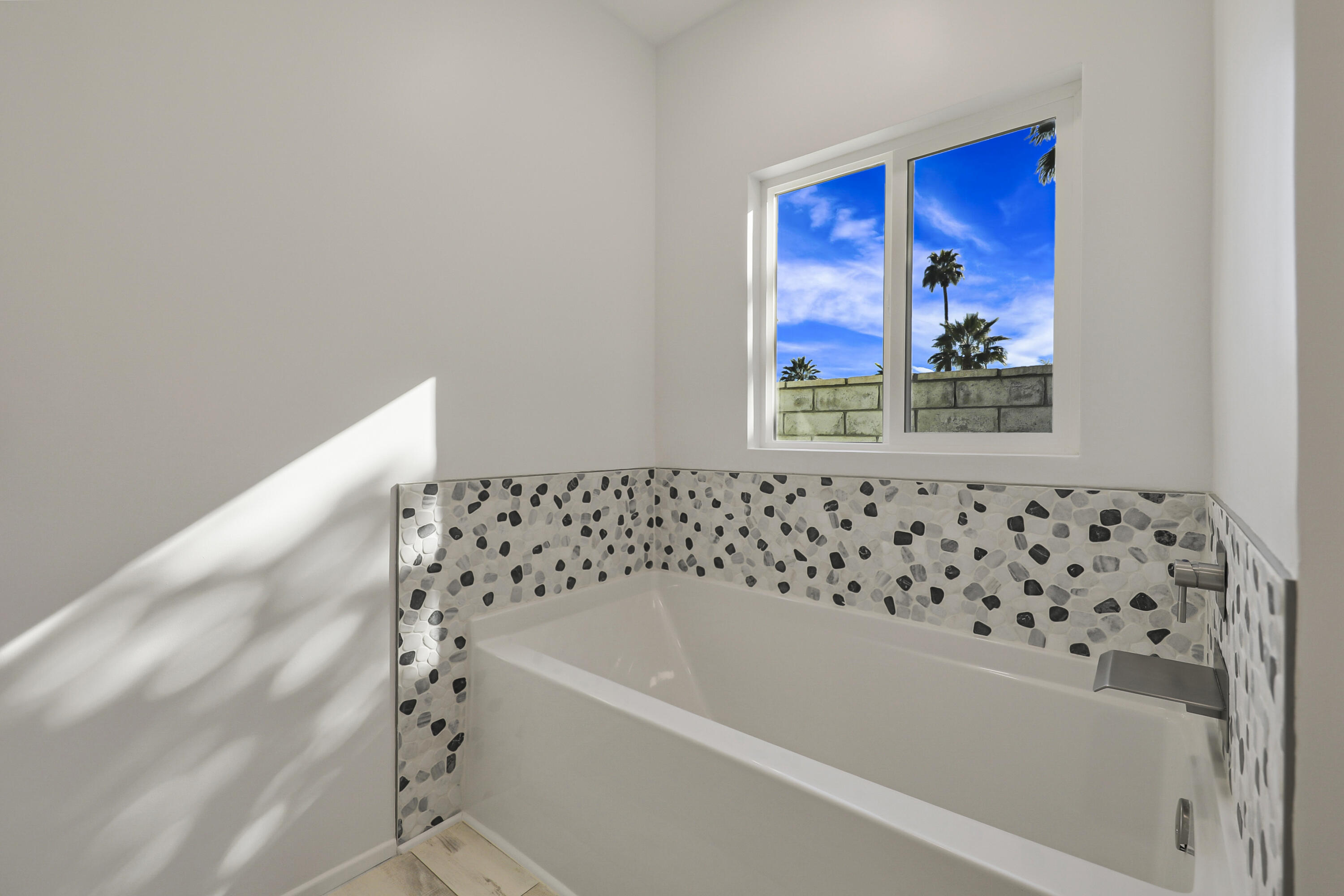126 Monte Carlo Street Rancho Mirage, CA 92270 - Photo 22 of 33 a bathroom with a bathtub and a shower