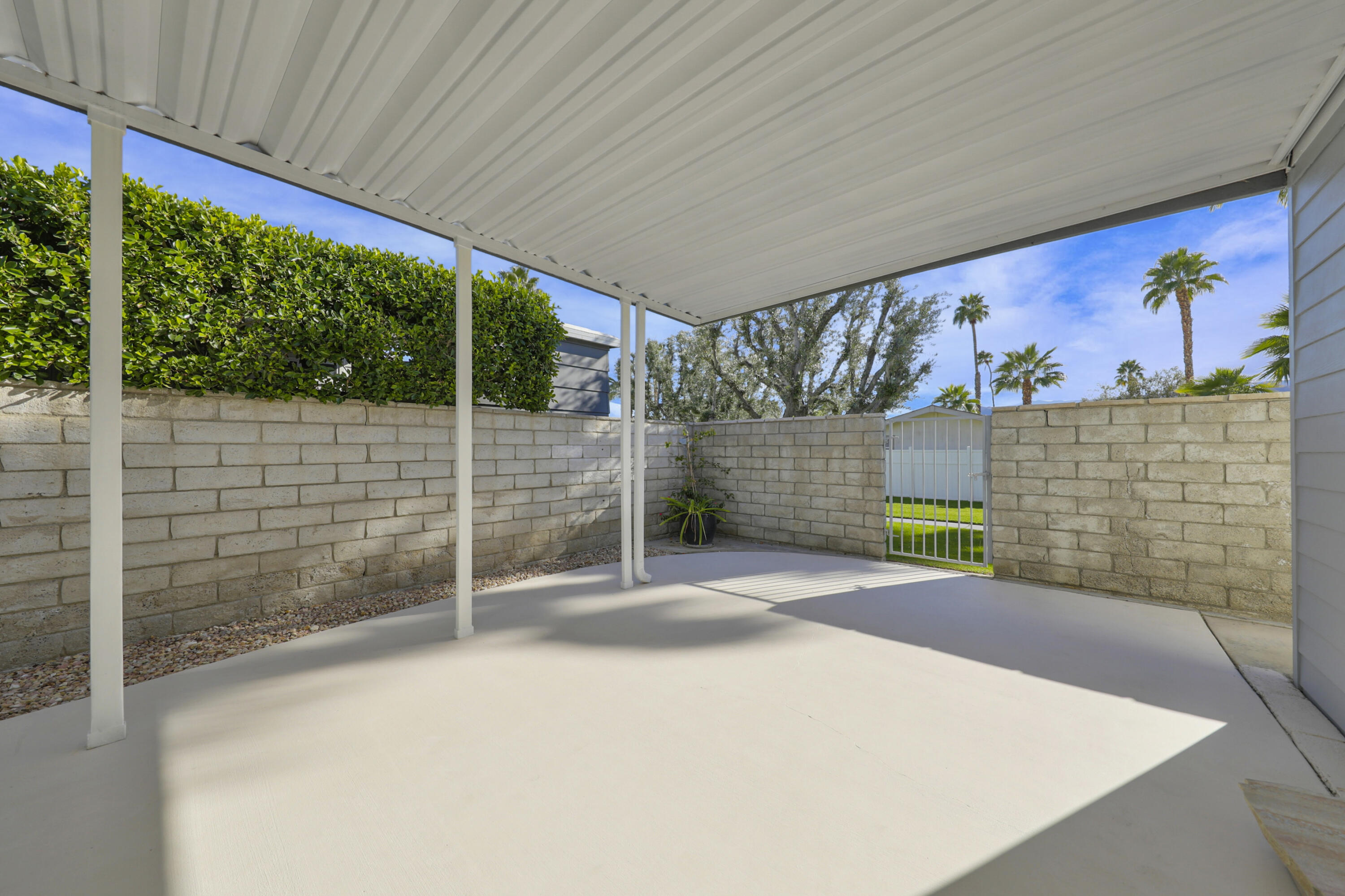 126 Monte Carlo Street Rancho Mirage, CA 92270 - Photo 24 of 33 a view of a backyard