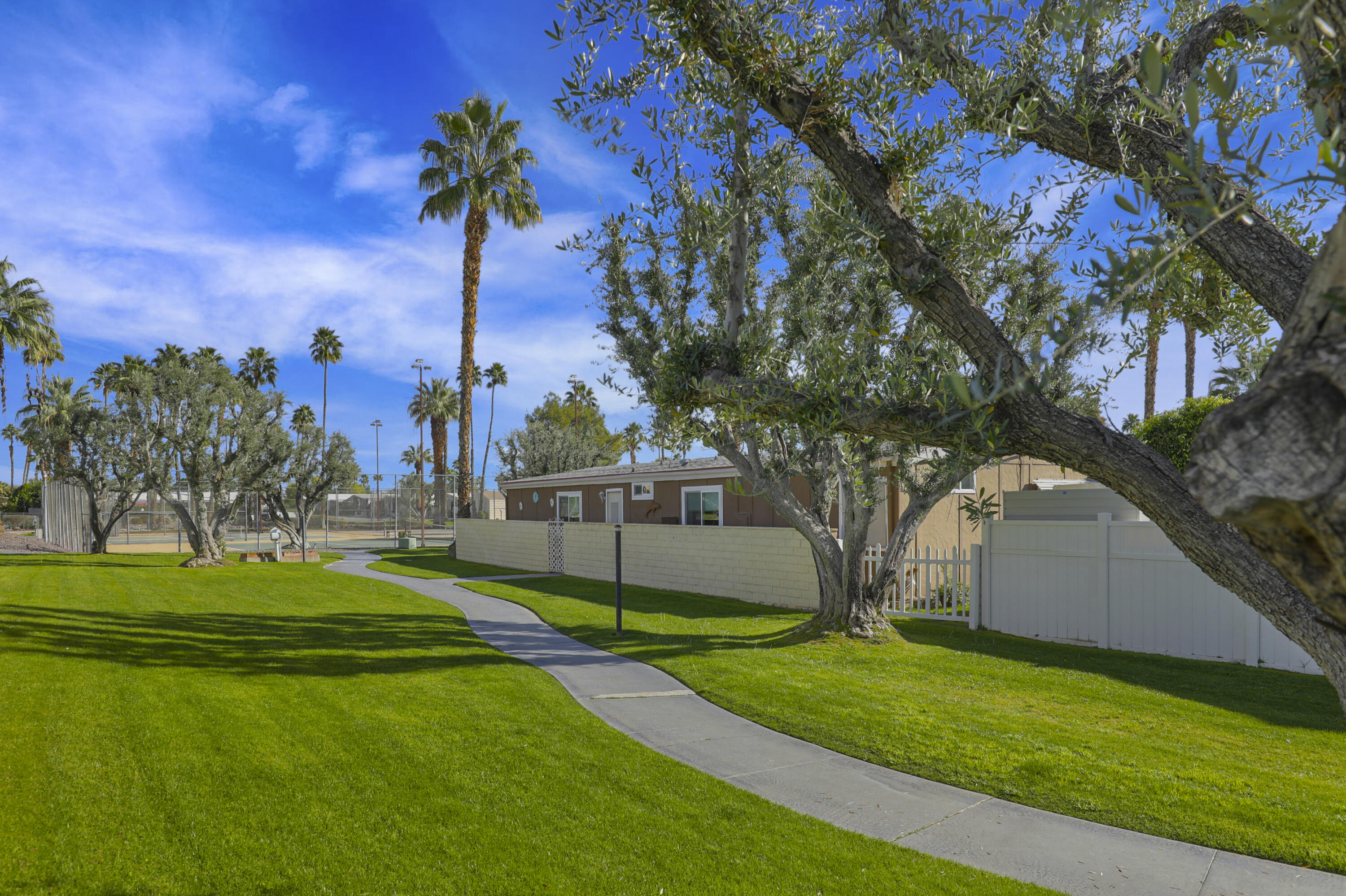 126 Monte Carlo Street Rancho Mirage, CA 92270 - Photo 27 of 33 a view of a playground with basketball court