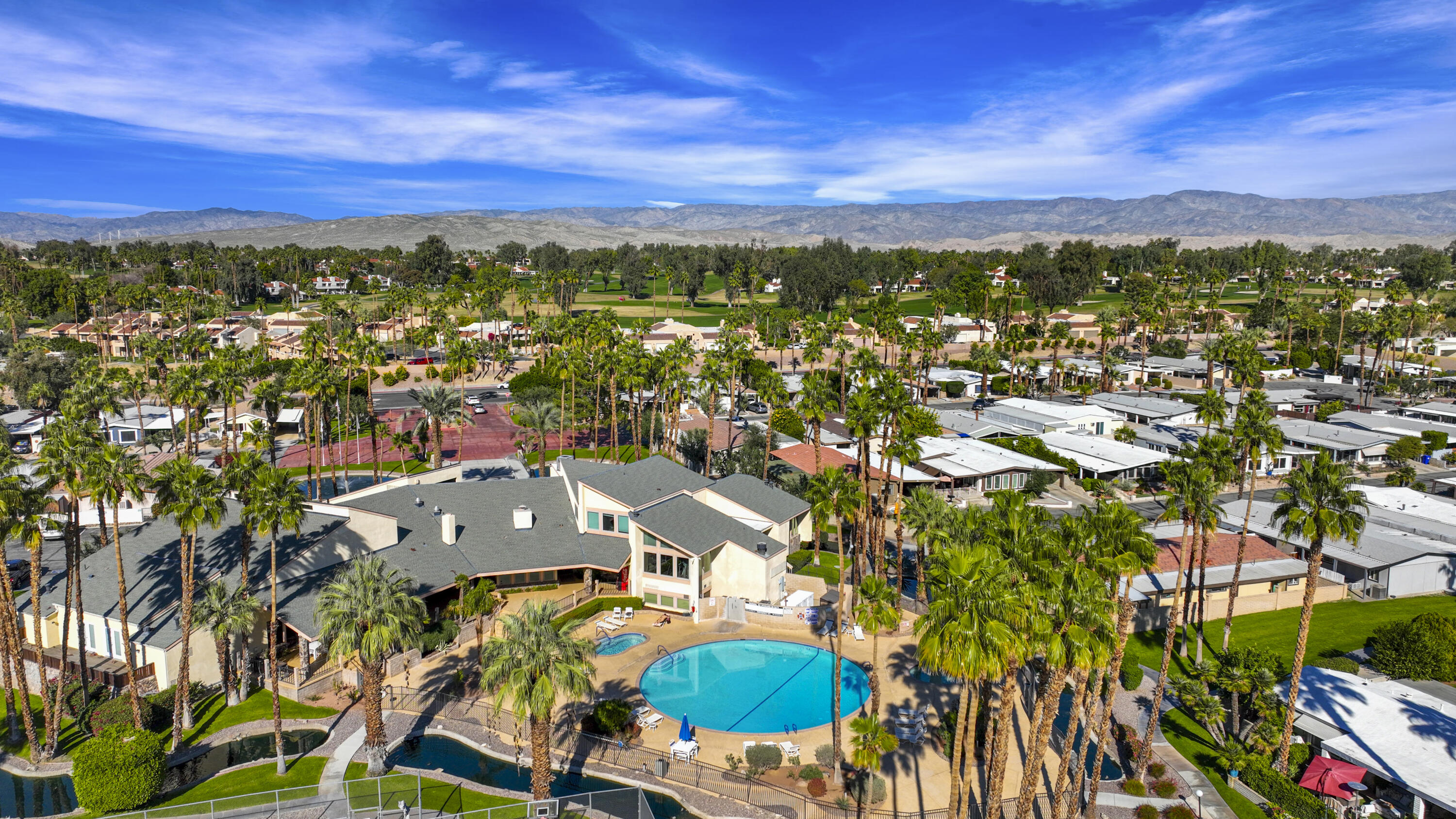 126 Monte Carlo Street Rancho Mirage, CA 92270 - Photo 33 of 33 an aerial view of residential houses with outdoor space and trees