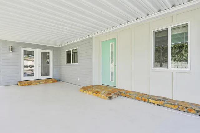 a view of a bedroom with window