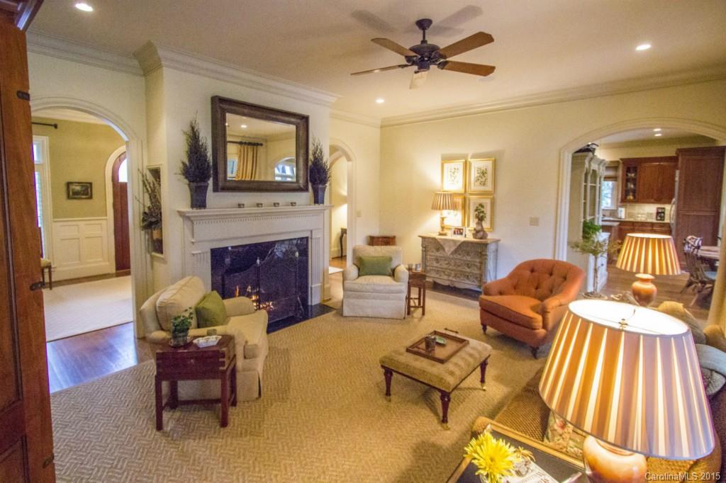1930 Harris Road Charlotte, NC 28211 - Photo 11 of 21 a living room with furniture fireplace and a flat screen tv