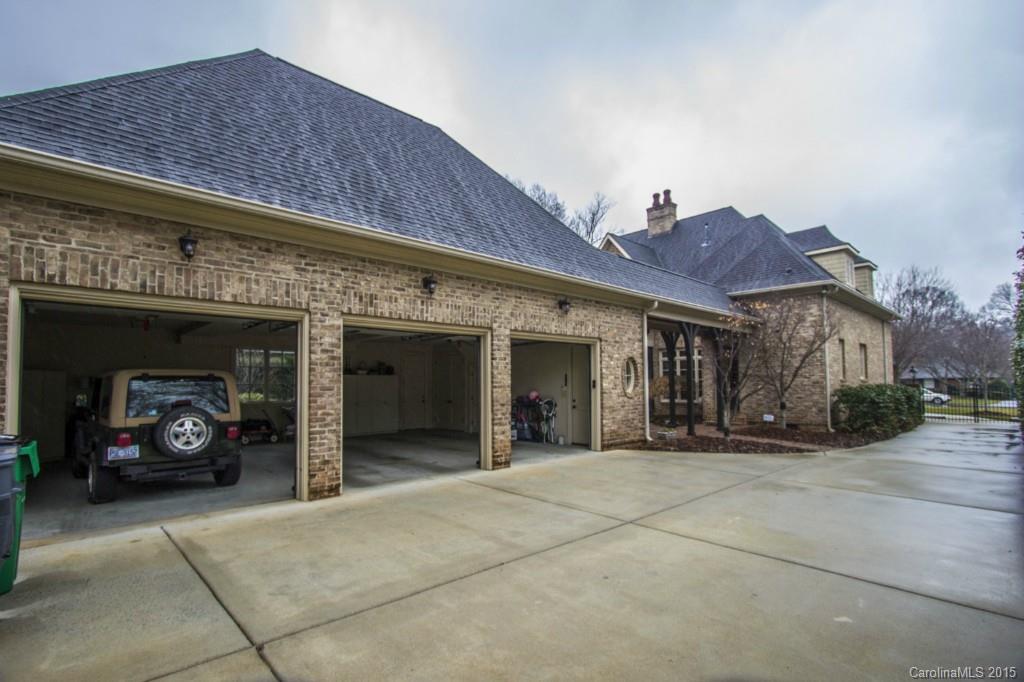 1930 Harris Road Charlotte, NC 28211 - Photo 20 of 21 a view of a house with outdoor space and a car parked