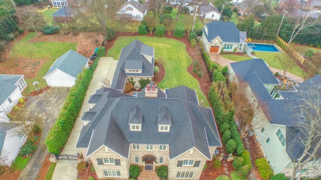1930 Harris Road Charlotte, NC 28211 - Photo 3 of 21 an aerial view of a house with outdoor space and a lake view