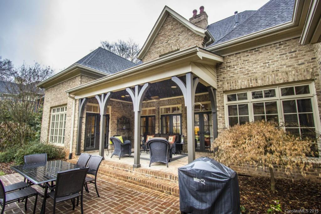 1930 Harris Road Charlotte, NC 28211 - Photo 4 of 21 a view of a patio with couches chairs and potted plants