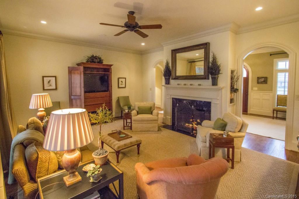 1930 Harris Road Charlotte, NC 28211 - Photo 7 of 21 a living room with furniture fireplace and a flat screen tv