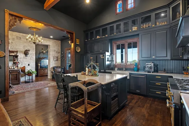 a living room with lots of furniture and a rug