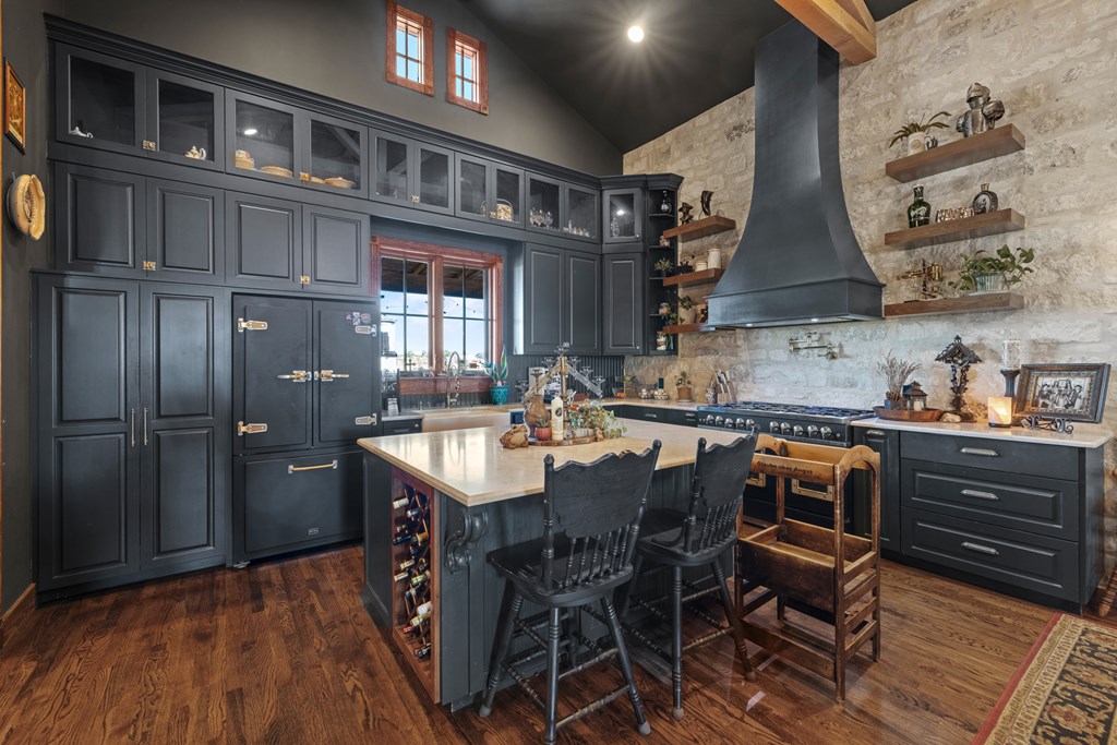 162 Flowering Sage Lane Comfort, TX 78013 - Photo 12 of 74 a kitchen with a table and chairs
