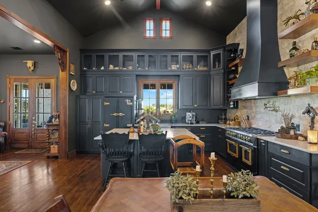 a view of a entryway door of the house and living room