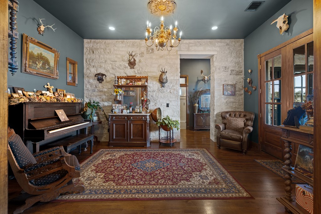 162 Flowering Sage Lane Comfort, TX 78013 - Photo 14 of 74 a living room with lots of furniture and a rug