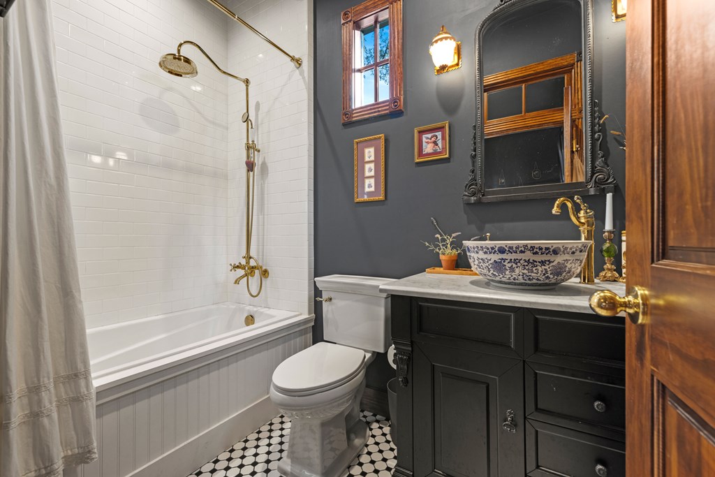 162 Flowering Sage Lane Comfort, TX 78013 - Photo 25 of 74 a bathroom with a sink a toilet and shower